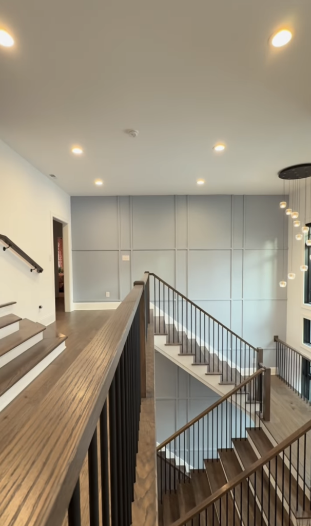 Discover how Holiday Farms homeowners use soft modern wall design to define the entire home. See this handcrafted feature and plan your Holiday Farms project today.